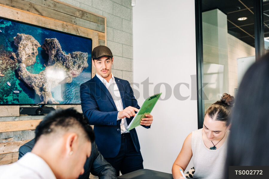 Businesspeople talking during meeting in boardroom