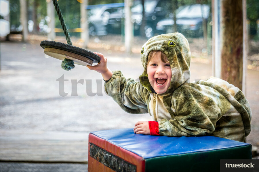 Toddler playing at the playground