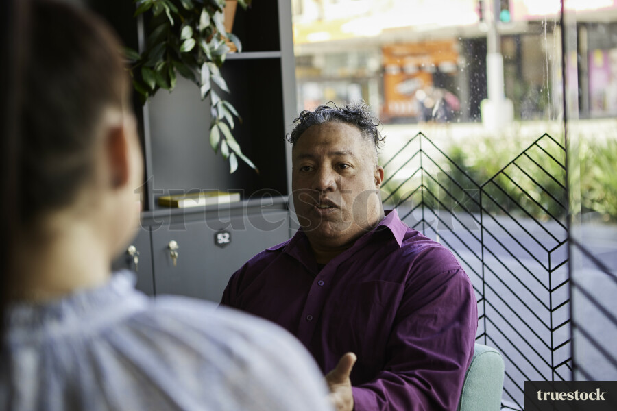 Man Talking in Meeting