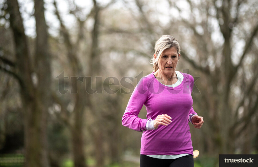 Woman Exercising In Cornwall Park