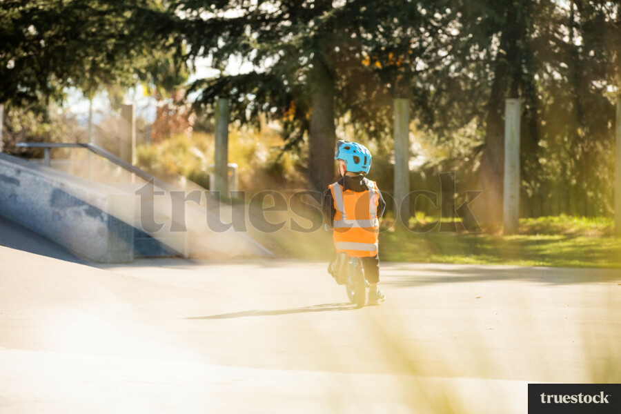 Boy on balance bike at skate park