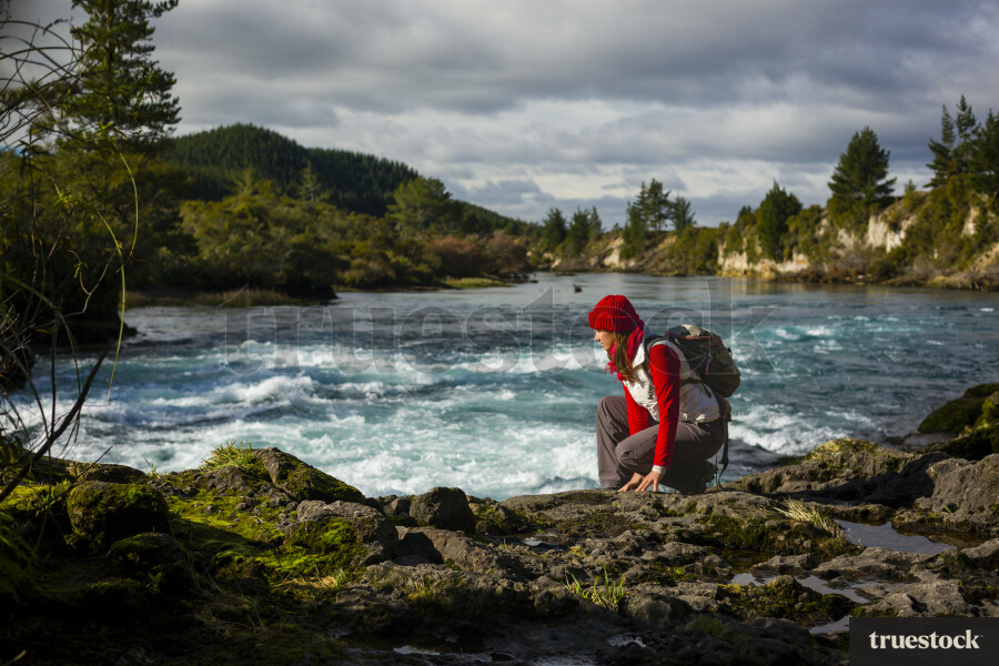 Tourist Kneeling down on Walk