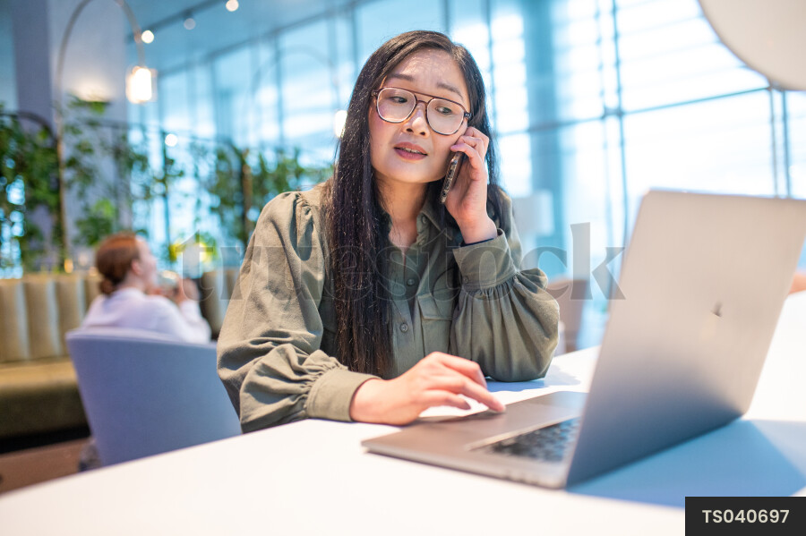 Woman on Phone at work