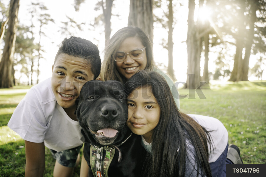 Family with Dog at Park