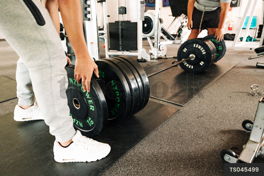 Teenagers Working Out at Gym