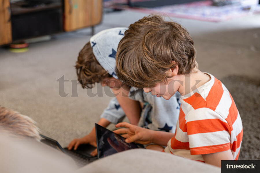 Children doing online school at home