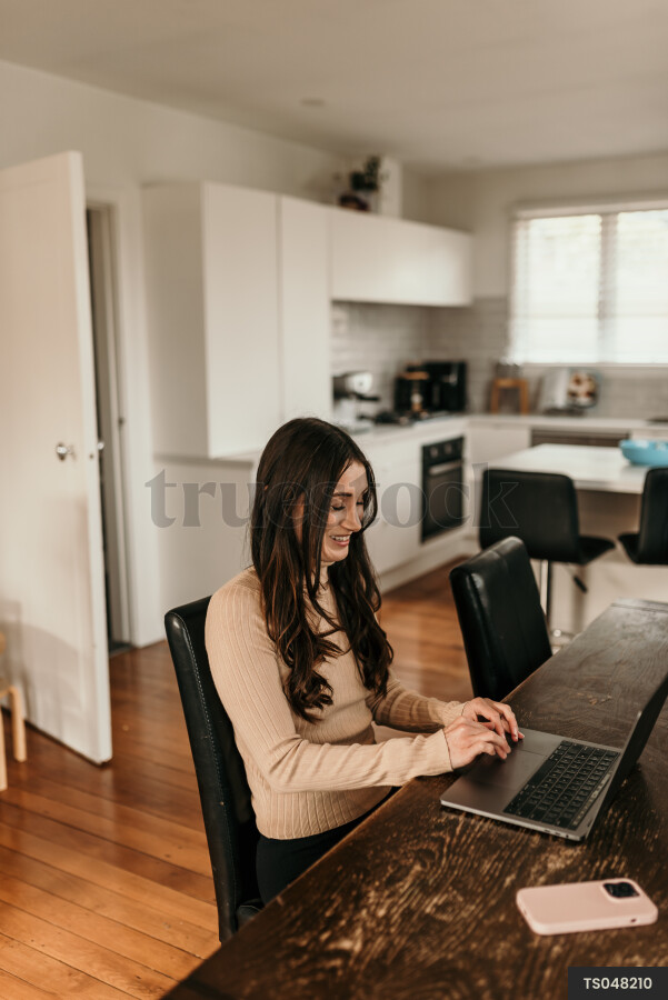Mother Using Laptop