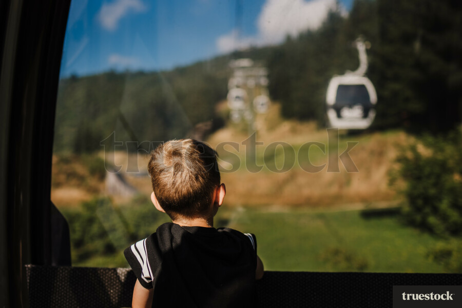 Boy looking at gondolas