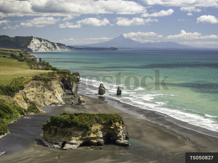 Aerial view of beach with rock formations in Tongaporutu