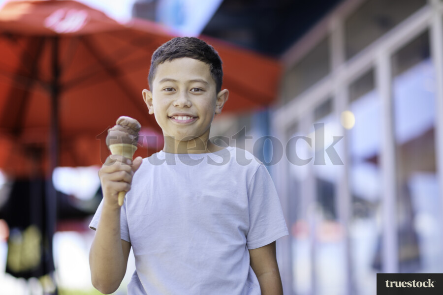 Young Boy Eating Ice Cream