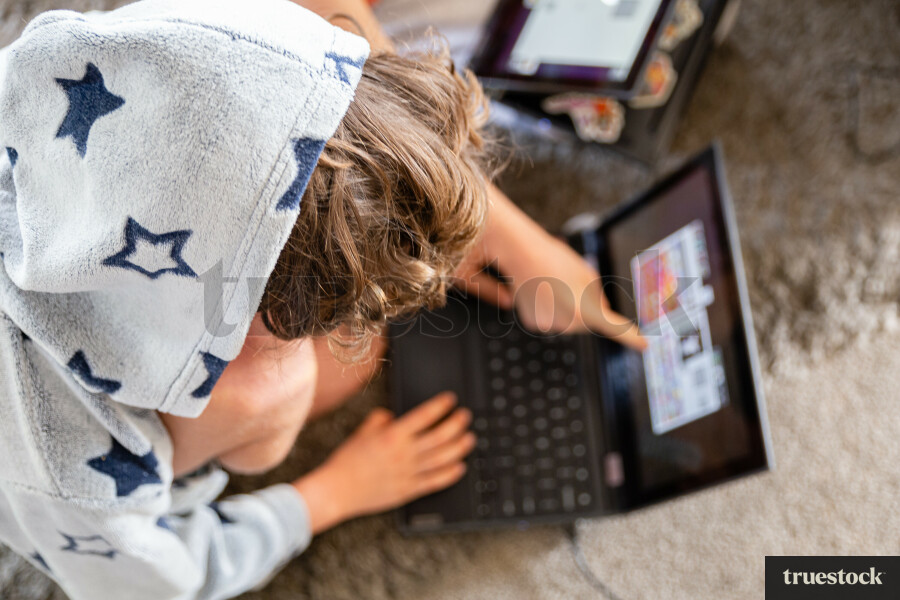 Children doing online school at home