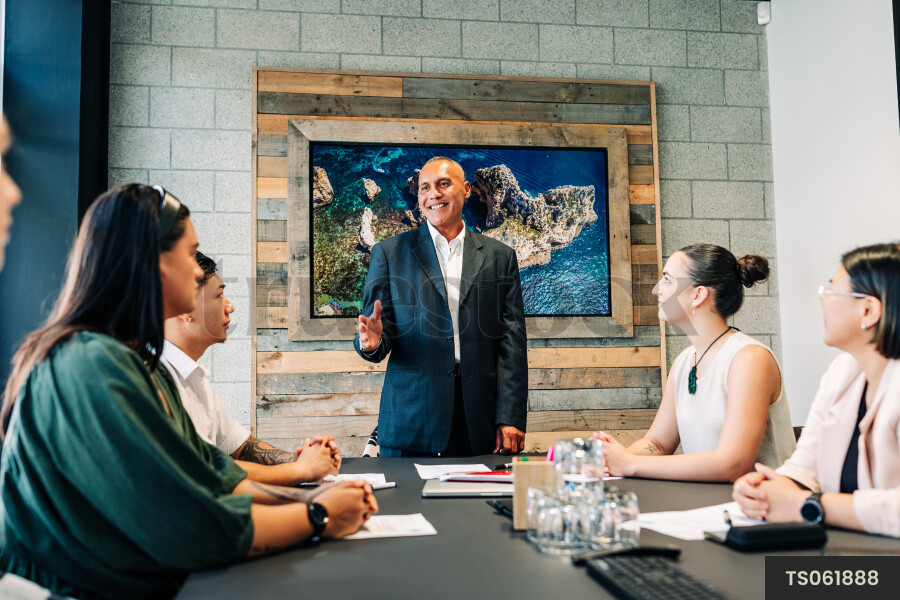 Businesspeople talking during meeting in boardroom