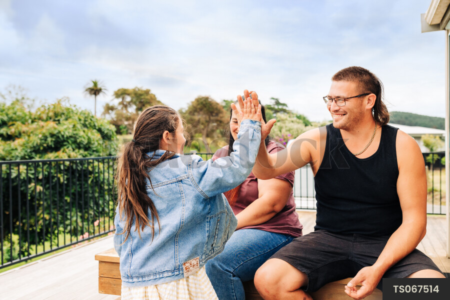 Girl with her parents on deck