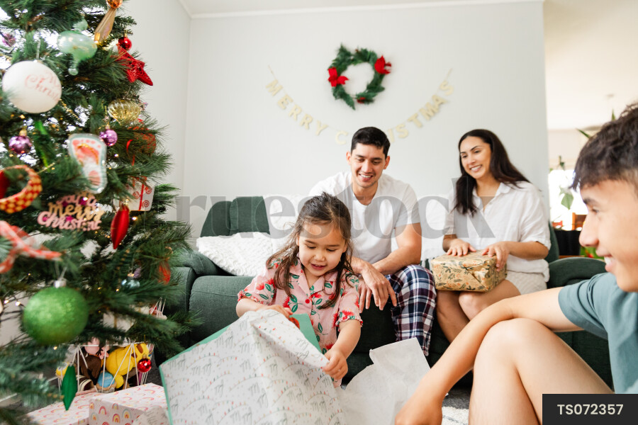 Family Opening Christmas Gifts