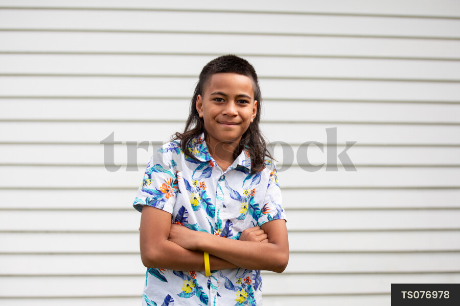 Portrait of stylish togan boy with mullet hair