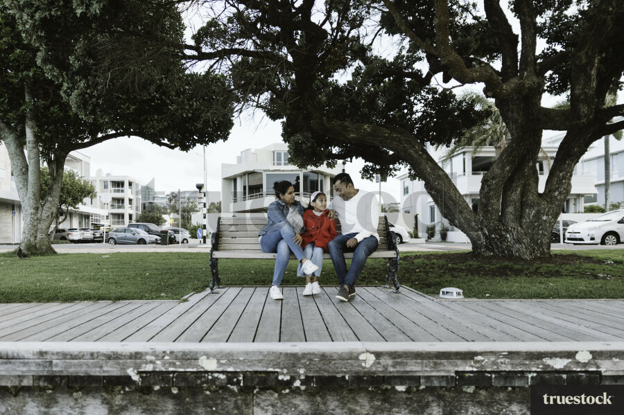 Family Looking at Phone
