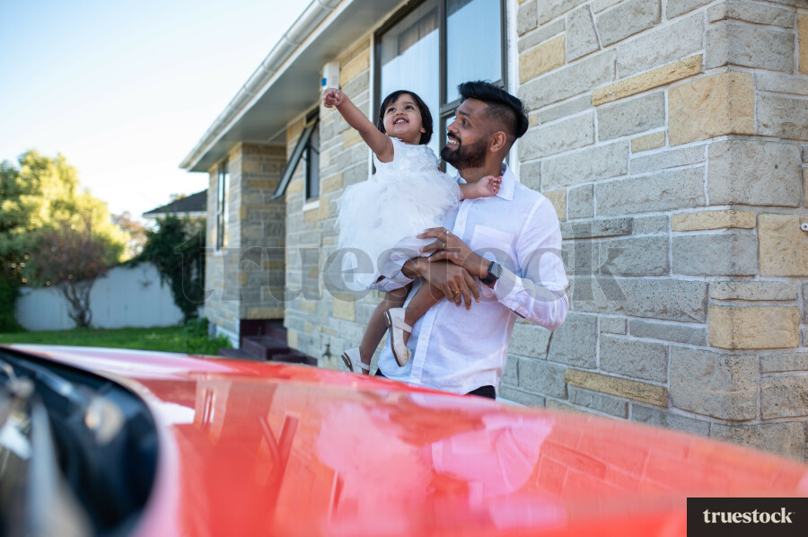 Father and Daughter Outside Home