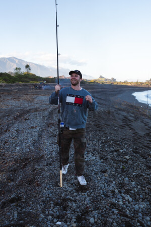Man fishing on beach