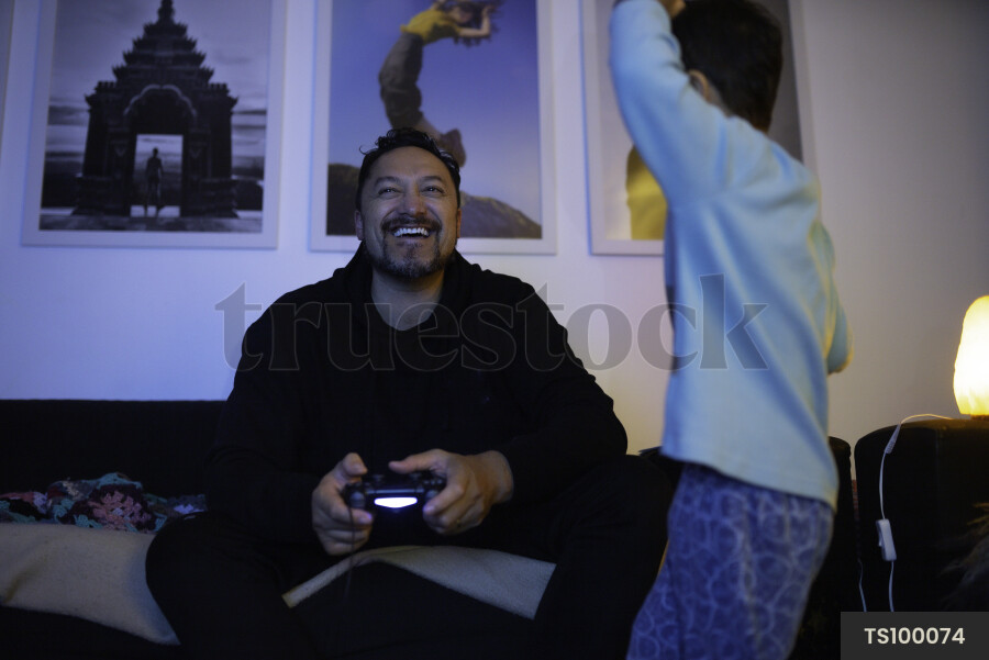 Father and Son Playing Video Games