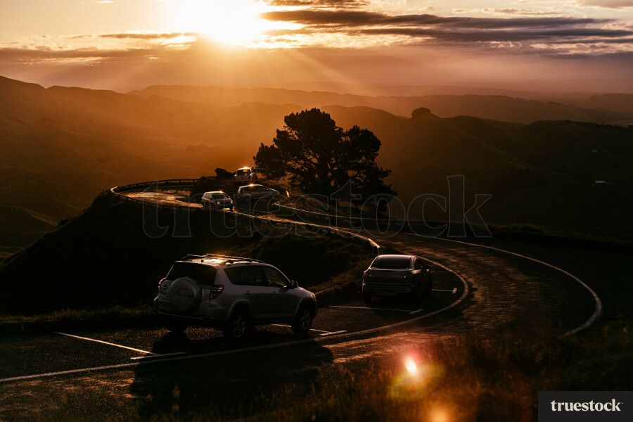 Cars Parked At Sunset