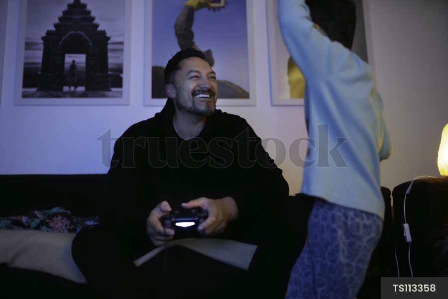 Father and Son Playing Video Games