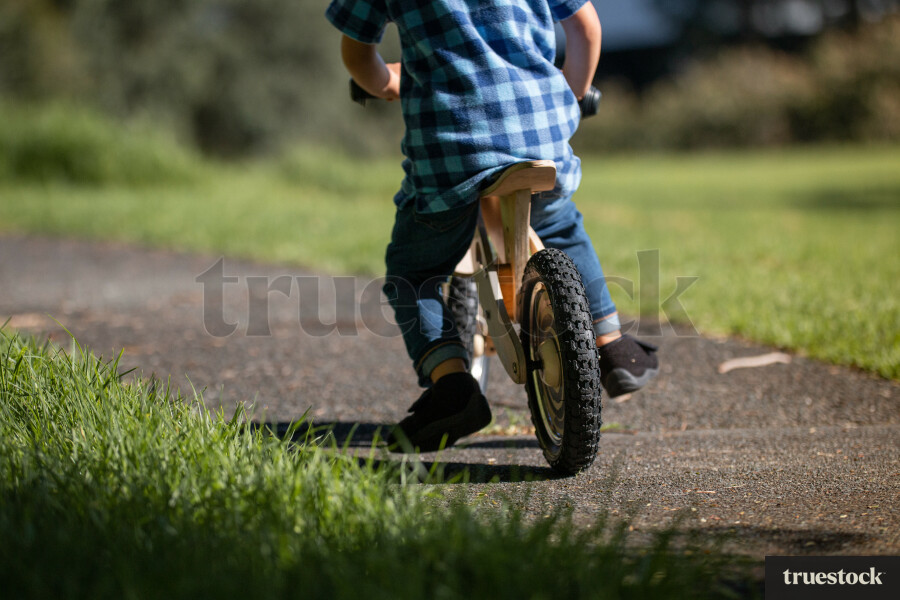 Child going for a bike ride on a pushbike