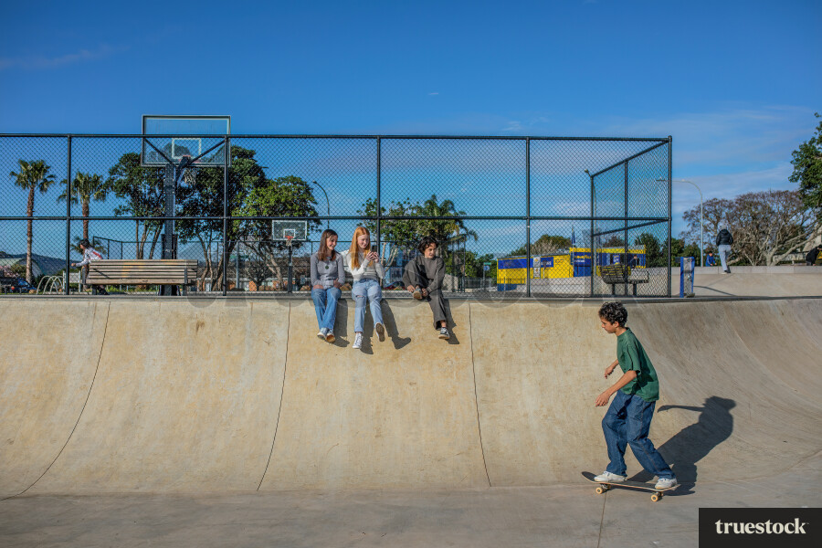 Teenagers in Skate Park on Ramp