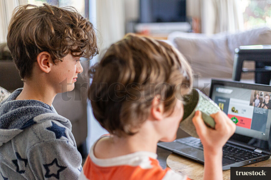 Children doing online school at home