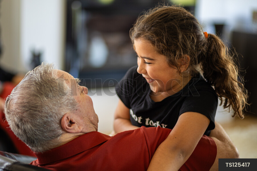 Grandad and Granddaughter on Couch