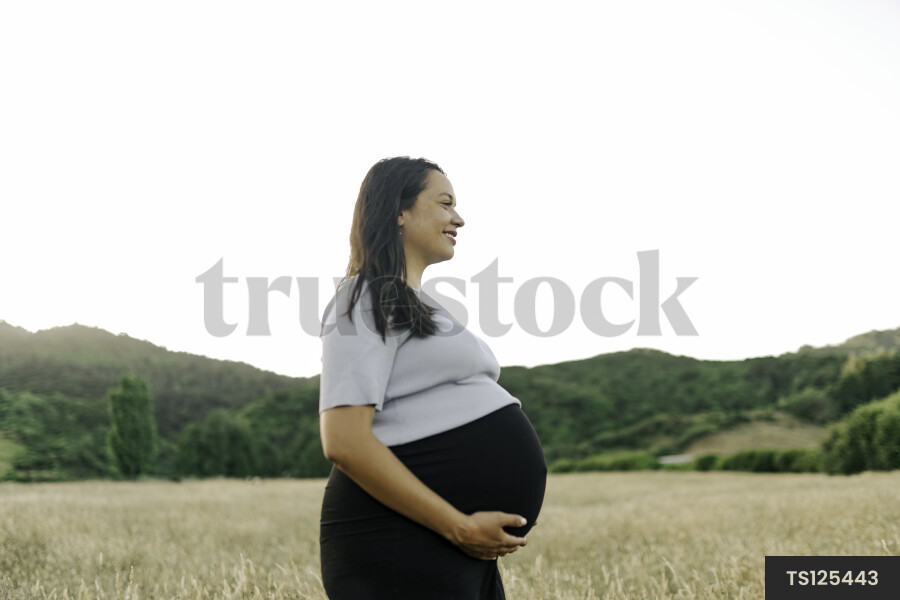 Pregnant Woman in Field