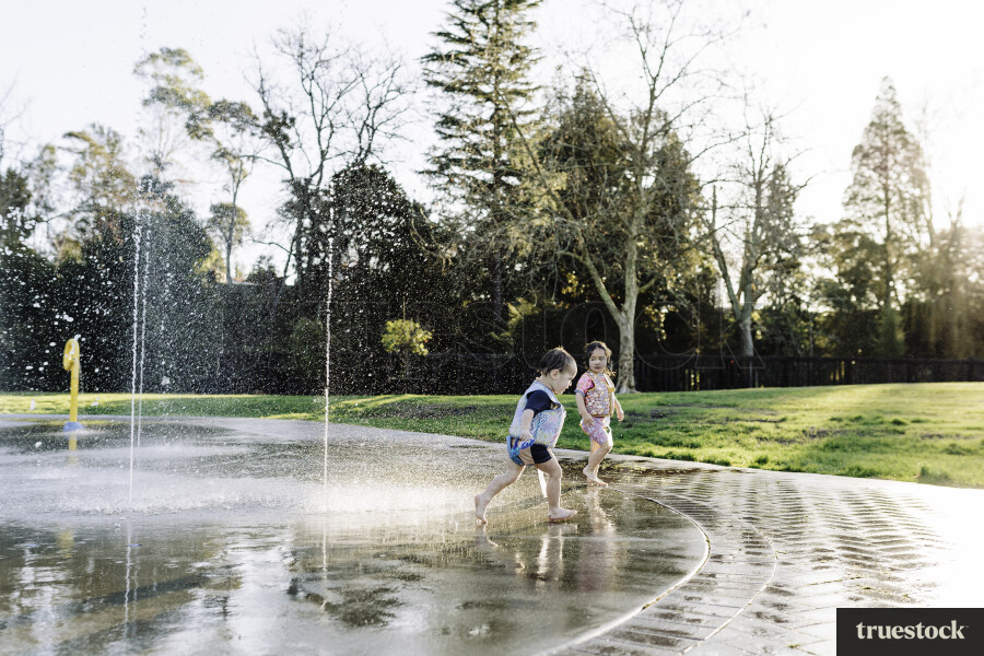 Young Girl Playing in Water