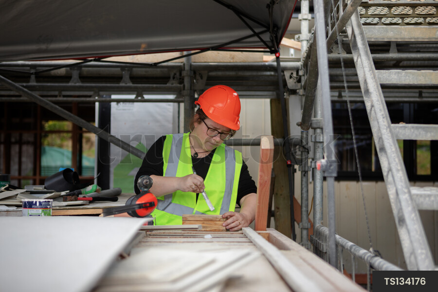 Woman working in construction site