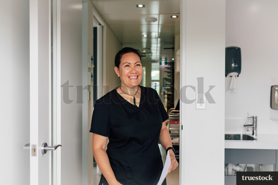 Nurse Holding Papers