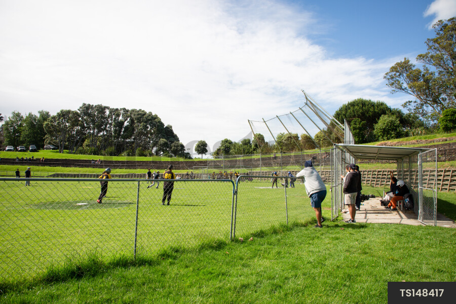 Parents Watching Softball Game