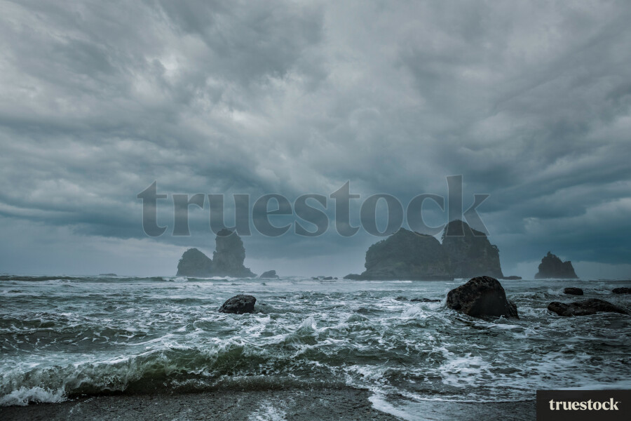 Small islands and big rocks in the ocean at the beach