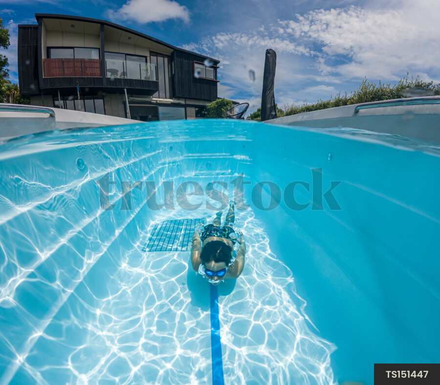Kids Swimming in Pool
