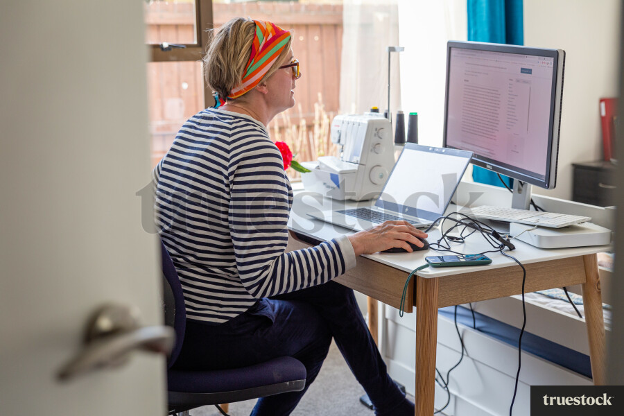 Adult working from home in home office