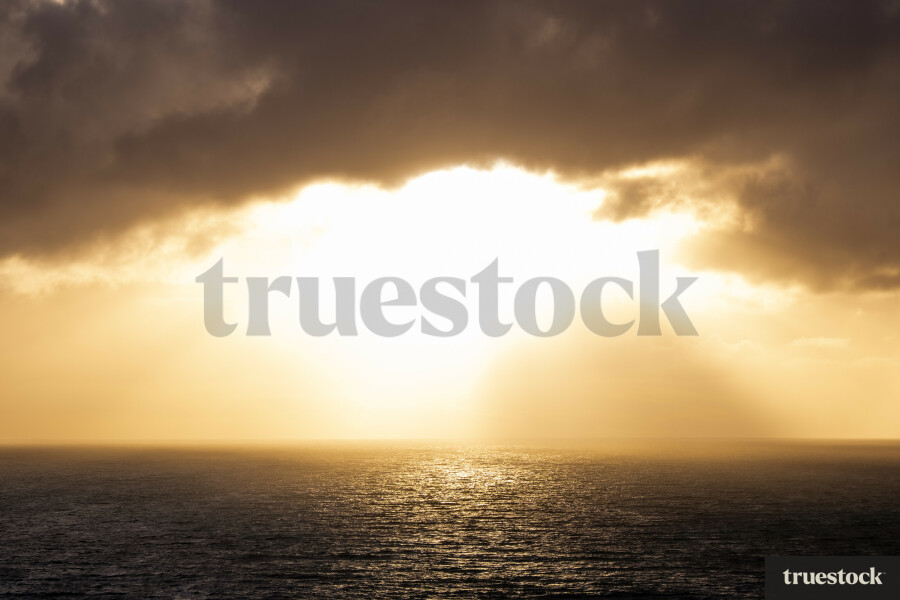 Sun shining through the clouds