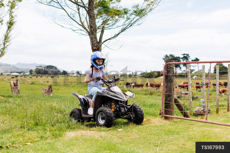 Young Girl on Quad Bike