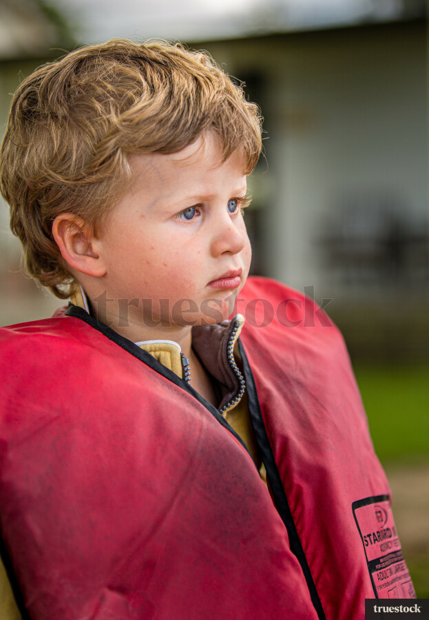 Toddler wearing a lifejacket