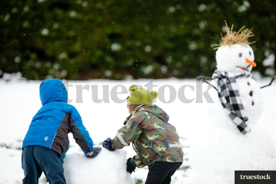 Children building a snowman