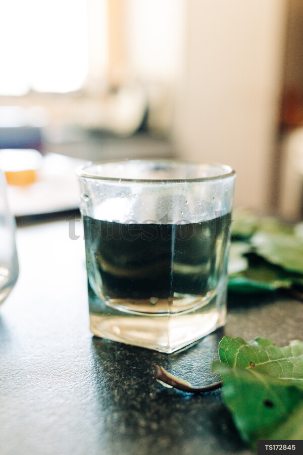 Close-up of preparation of kawakawa leaves