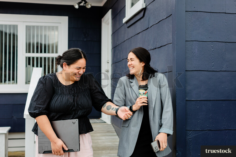Colleagues Talking While Walking