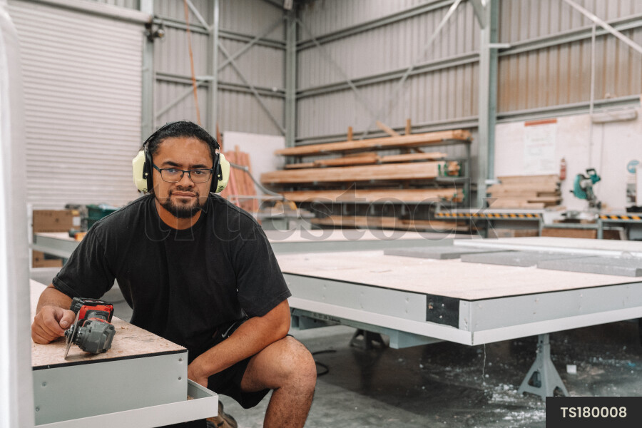 Portrait of Worker With Tool