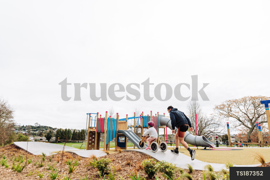 Young Girl on Bike at Park