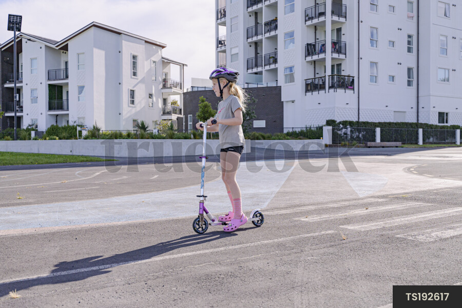 Young Girl on Scooter