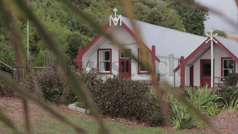 Boy playing at St. Mary's Church in Otaki