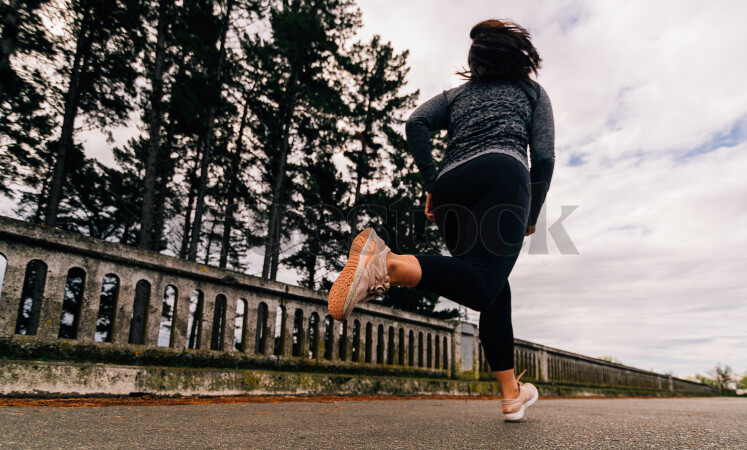 Woman in activewear running