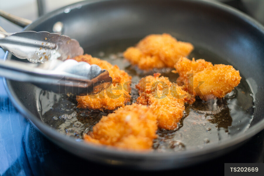 Fried food in frying pan
