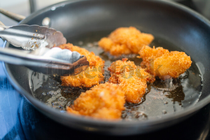 Fried food in frying pan